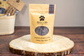 Bag with chamomile blueberry honey dog treats. | Sac avec des gâteries pour chiens à la camomille, bleuets et miel.