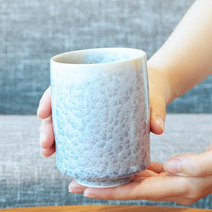 Flower crystal yunomi Japanese tea cup with blue-white glaze held in both hands | Kyoto-Kiyomizu ware, Touan