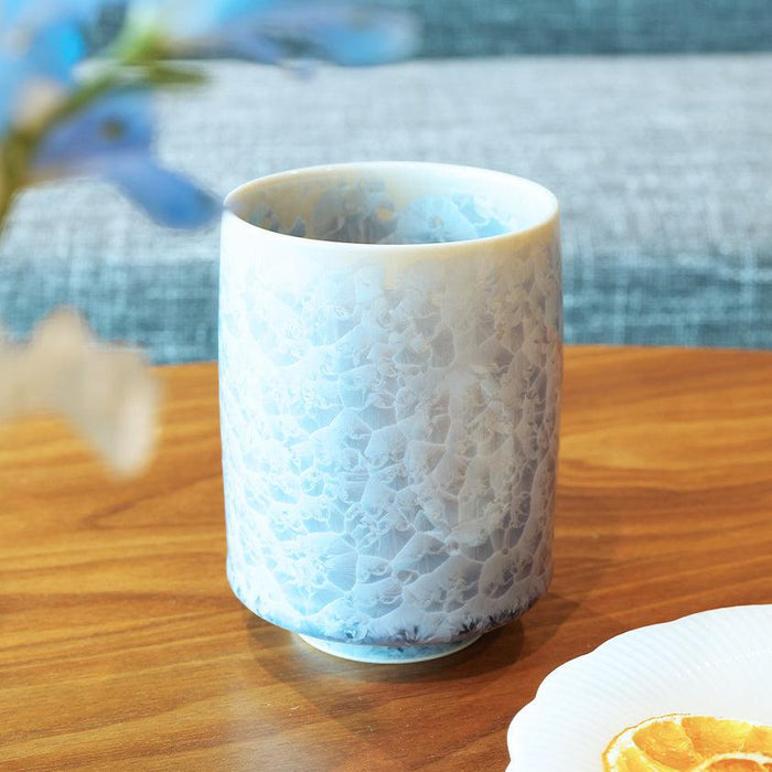 Flower crystal yunomi Japanese tea cup with blue crystalline glaze on wooden table | Kyoto-Kiyomizu ware, Touan
