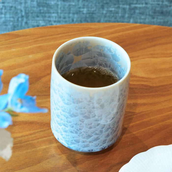 Flower crystal yunomi Japanese tea cup with white textured glaze holding green tea | Kyoto-Kiyomizu ware, Touan