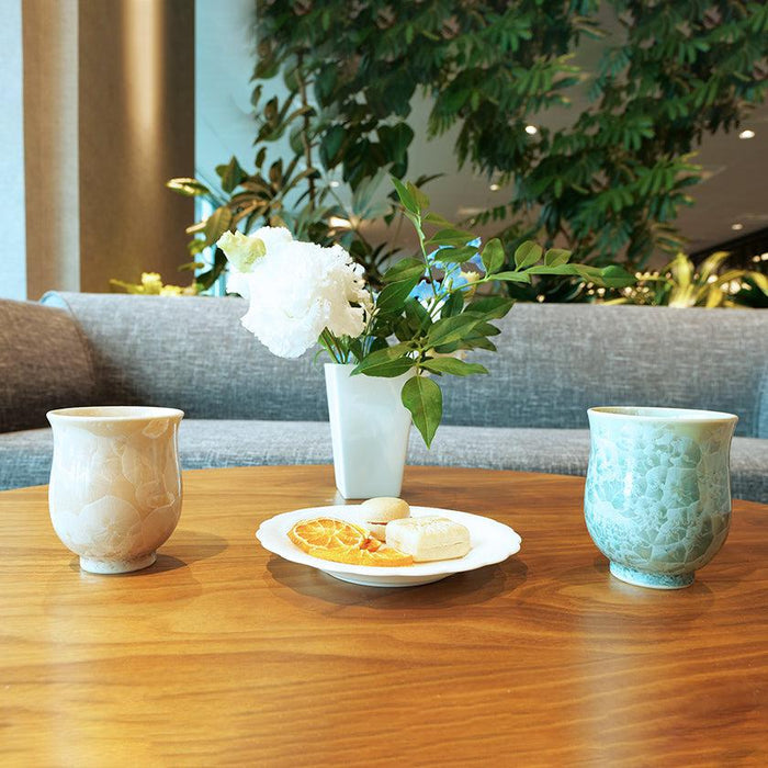 Kyoto-Kiyomizu ware yunomi tea cups with flower crystal glaze on a café table | Touan, Kyoto
