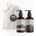 Two bottles of 'The Grampians Goods Co' hand wash and cream with a drawstring bag on a white background.