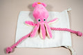 Soft toy for small dogs and puppies in the shape of an octopus with a squeaker inside. | Peluche pour chiens et chiots de petite taille en forme de pieuvre avec un couineur à l'intérieur.
